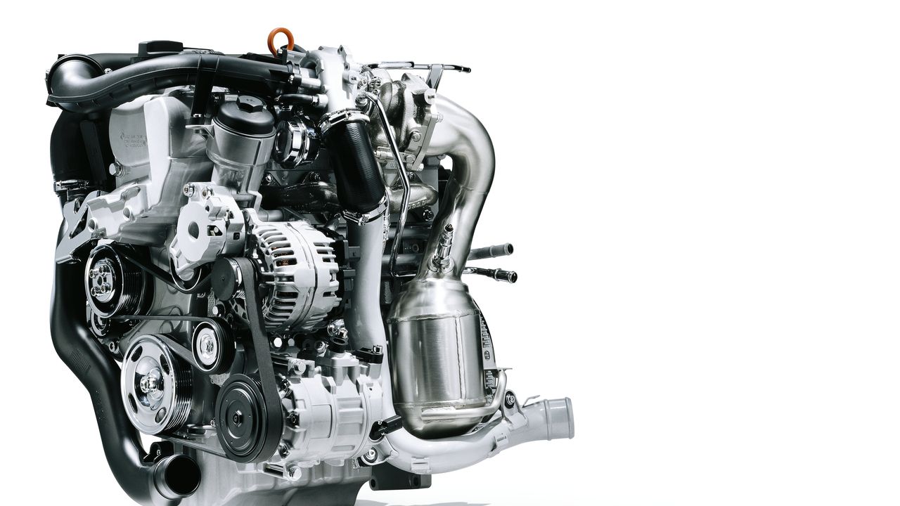 An etched image of a Volkswagen TSI engine block.