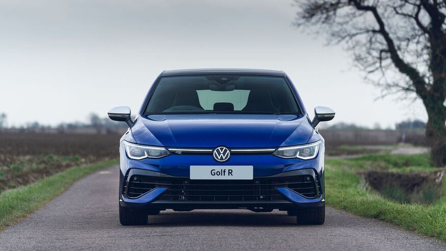 A blue Golf R and its dynamic motorsport inspire exterior features parked in a beautiful background