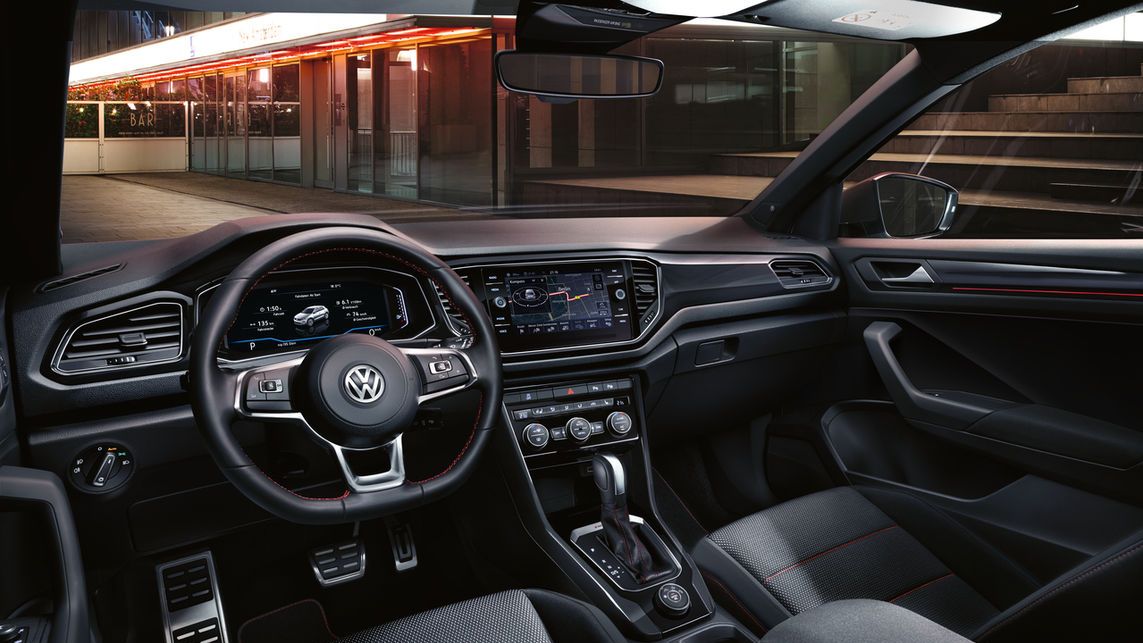 The interior of a modern Volkswagen vehicle highlighting the cockpit.