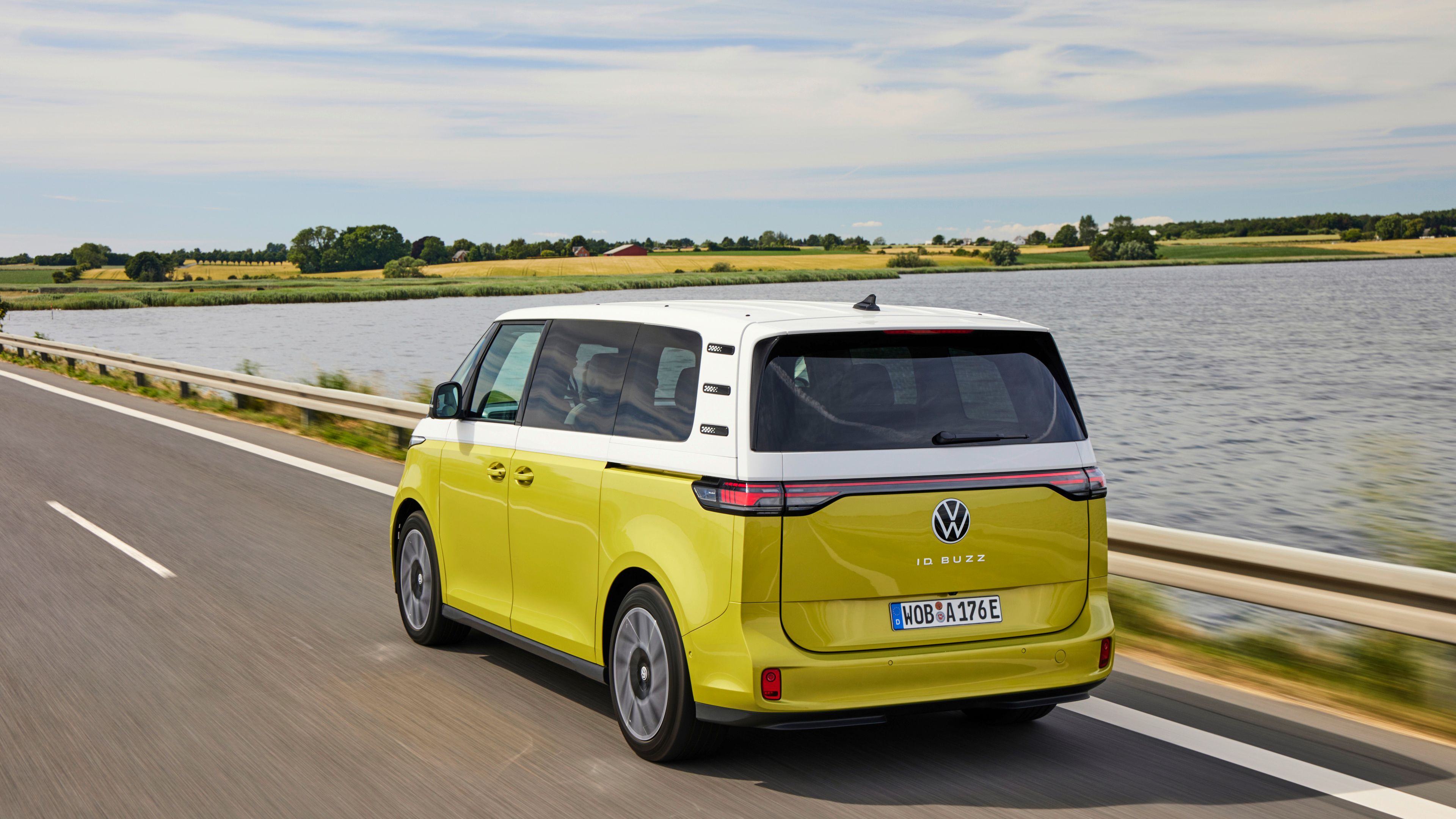 VW ID. Buzz cruising by a lake