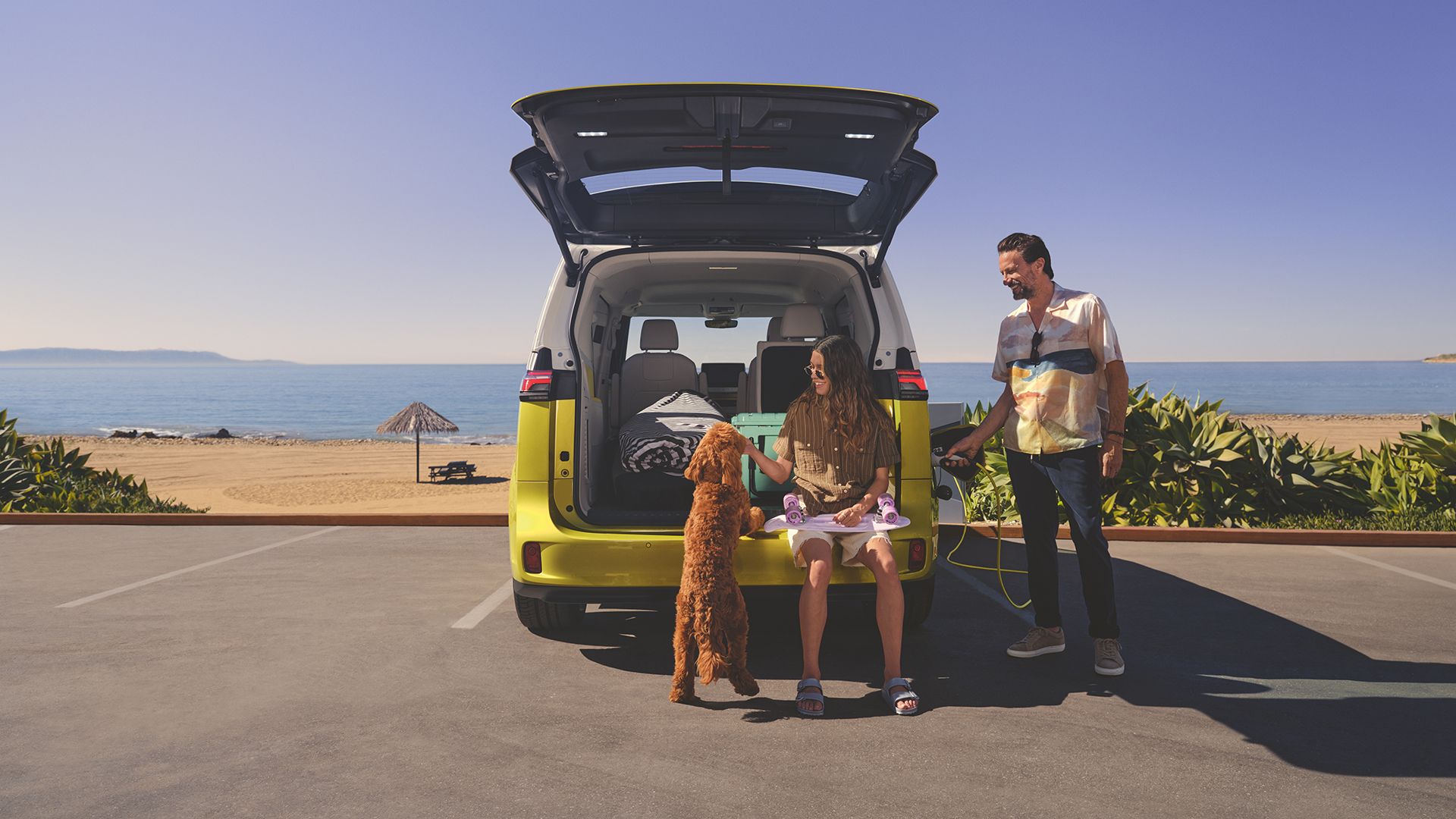A family relaxing at the back of their ID. Buzz