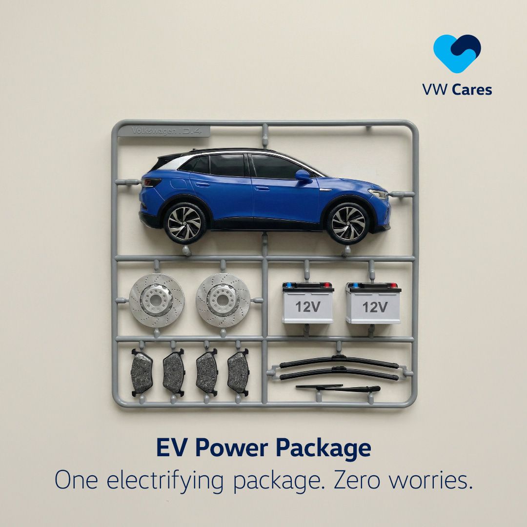 A blue electric vehicle laid out with its parts