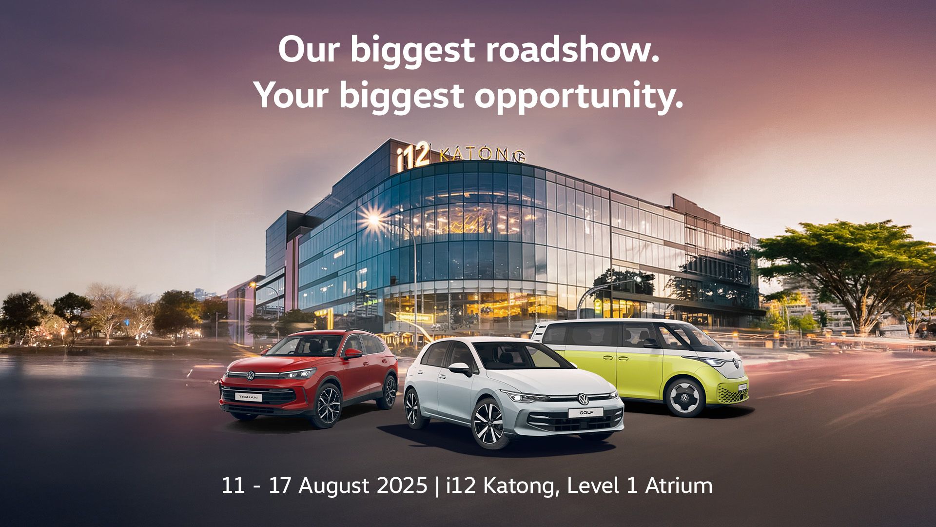 The Golf, Tiguan and ID. Buzz lined up in front of the i12 Katong facade