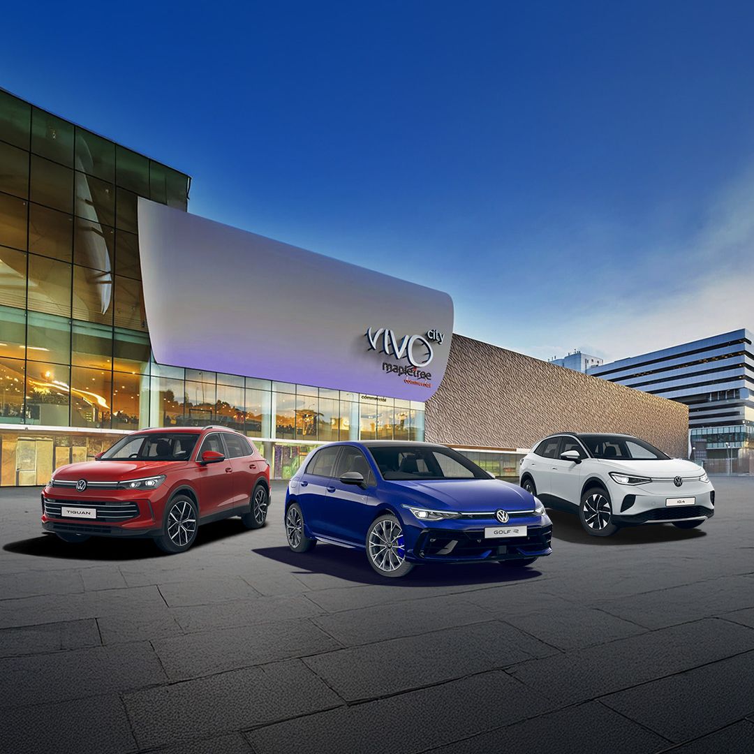 A range of Volkswagen cars showcased against the VivoCity facade