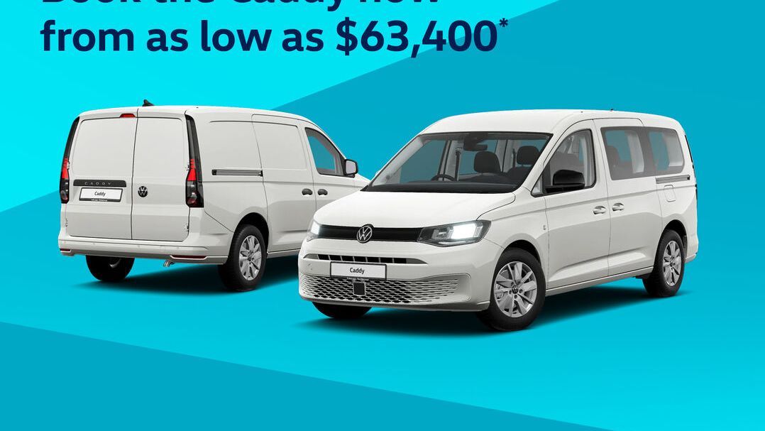 Two white Volkswagen vehicles next to each other with a blue geometric background