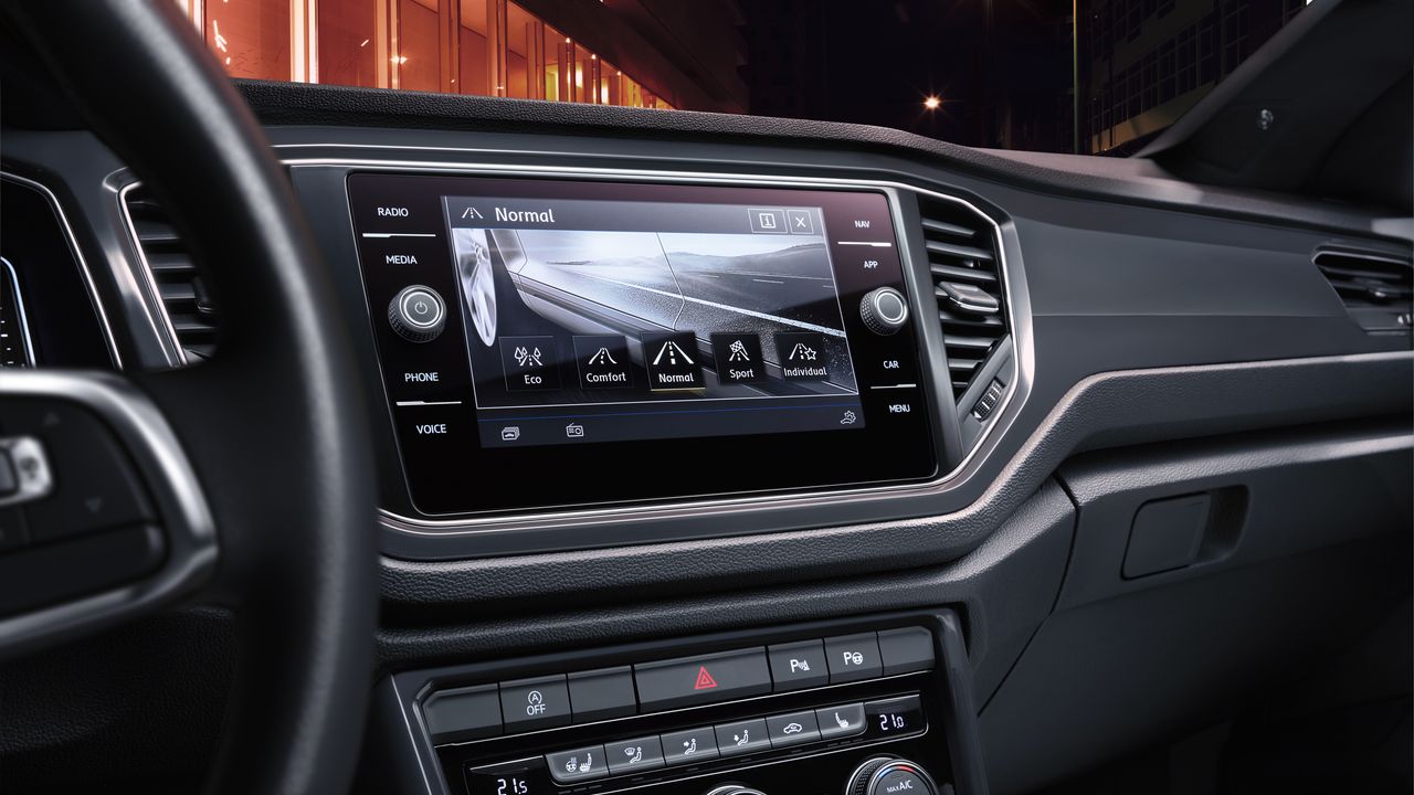 The driver profile selection feature being triggered via the Volkswagen infotainment system.