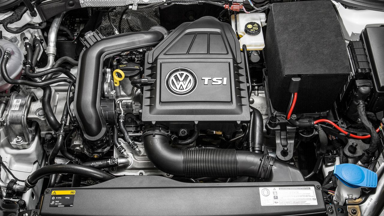A close-up look of the entire Volkswagen TSI engine assembled into a Volkswagen vehicle.