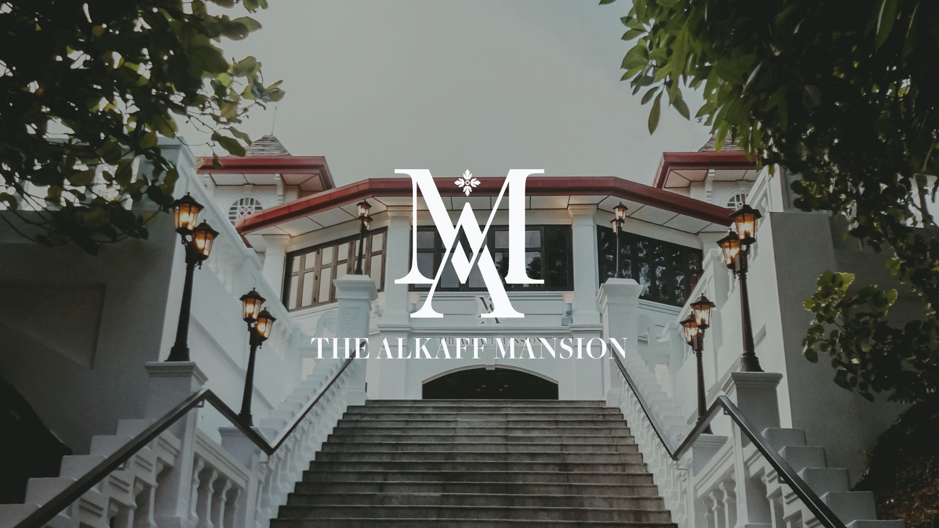 The Alkaff mansion facade with the logo on it