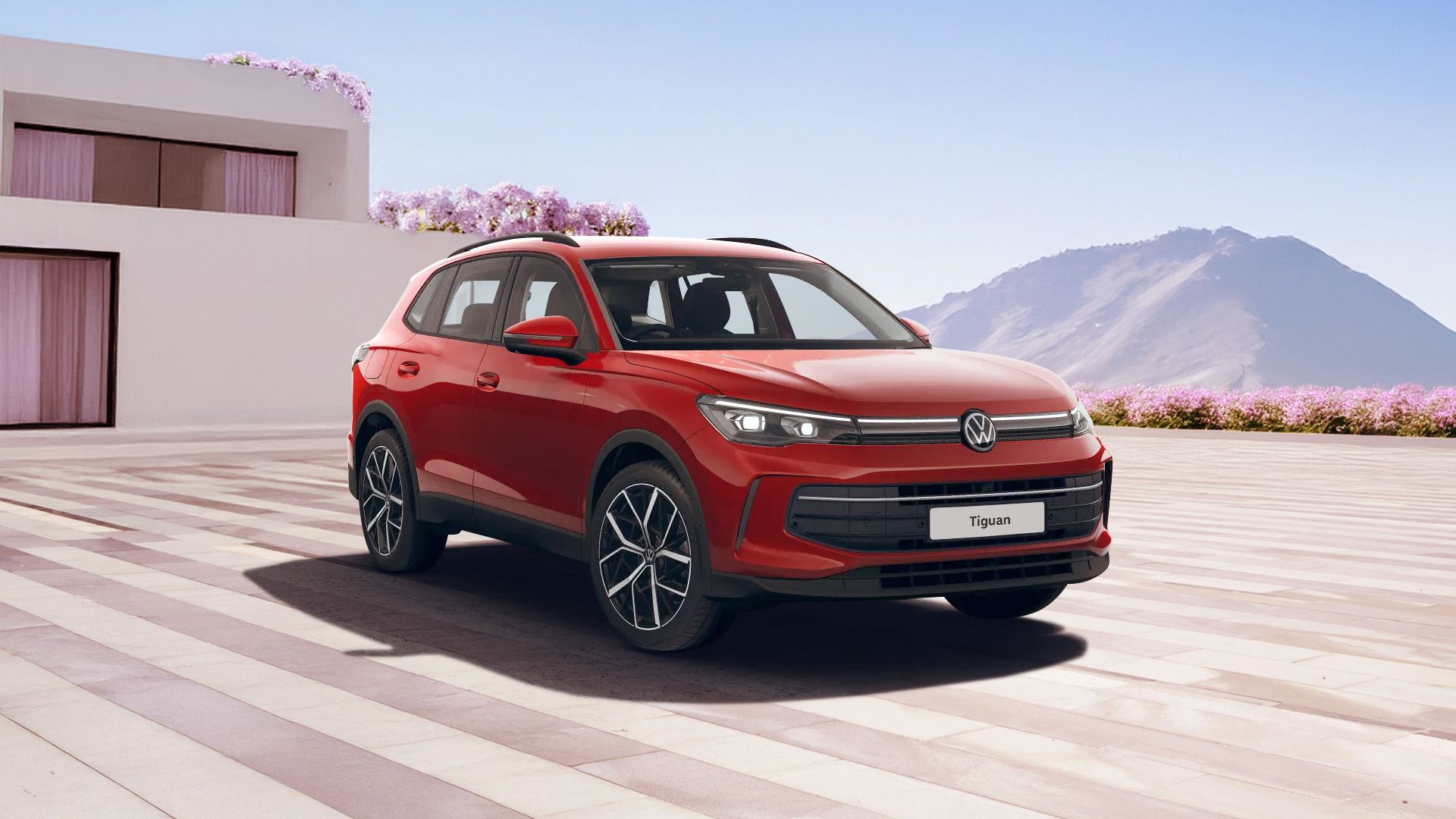 The Tiguan showcased against a scenic pastel background