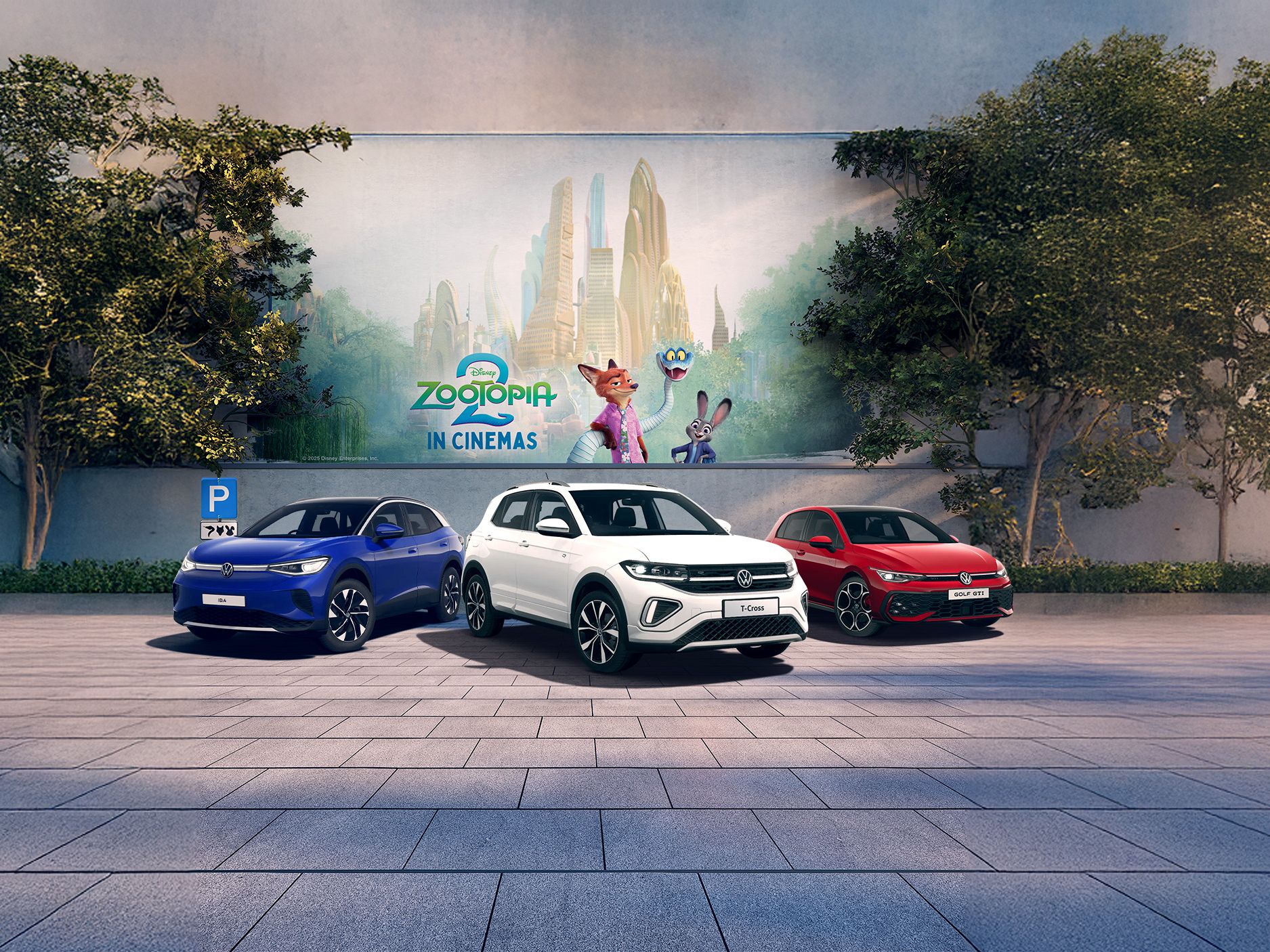 A blue ID.4, white T-Cross and red Golf GTI parked in front of a Zootopia 2 mural