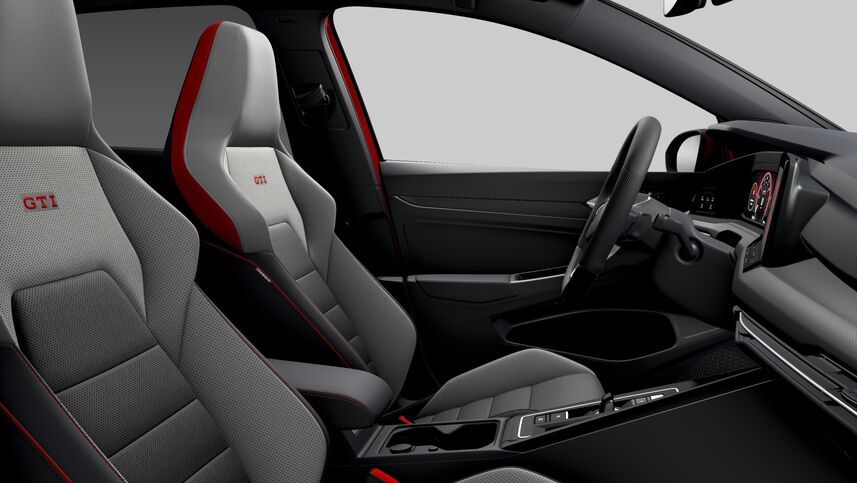 Volkswagen Golf GTI interior Volkswagen Golf GTI interior with ambient lighting, superb sports fabric seats with red 'GTI' label, beautiful sporty interior trimming, and a sports steering wheel.