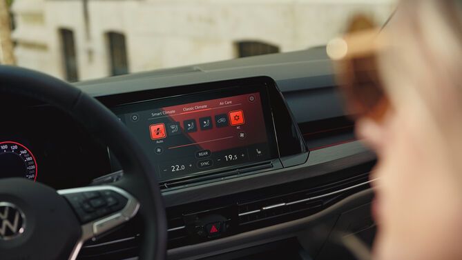 The infotainment display shows the 3-zone "Climatronic" feature which ensures clean air and healthy air conditioning in the car