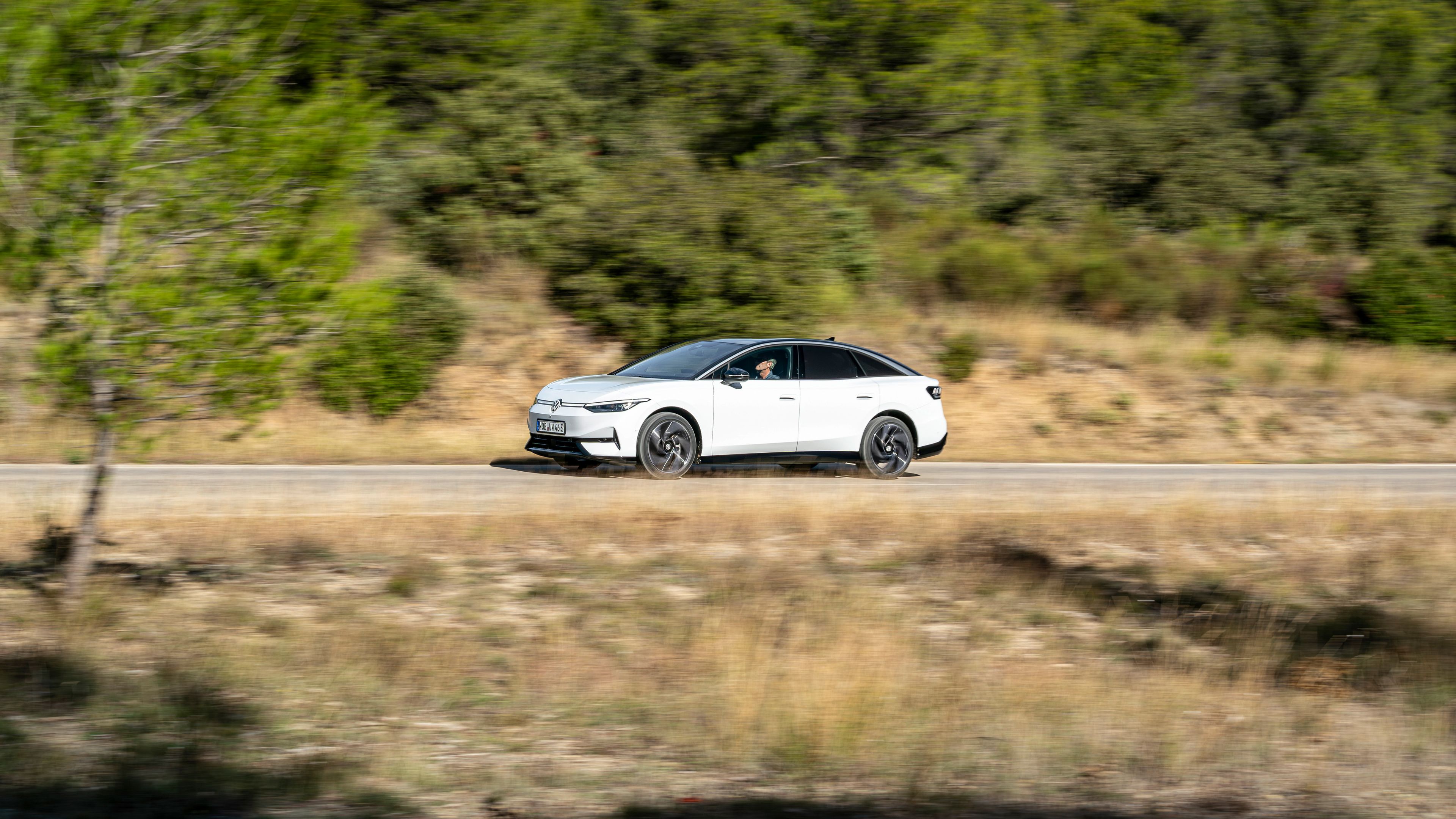A white ID.7 passing by on the road