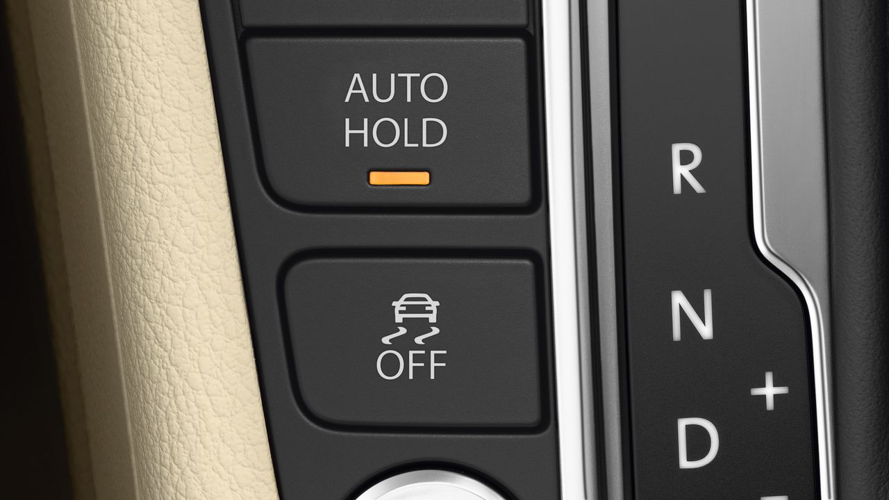 A close up look of a Volkswagen vehicle's Auto Hold system being switched on.