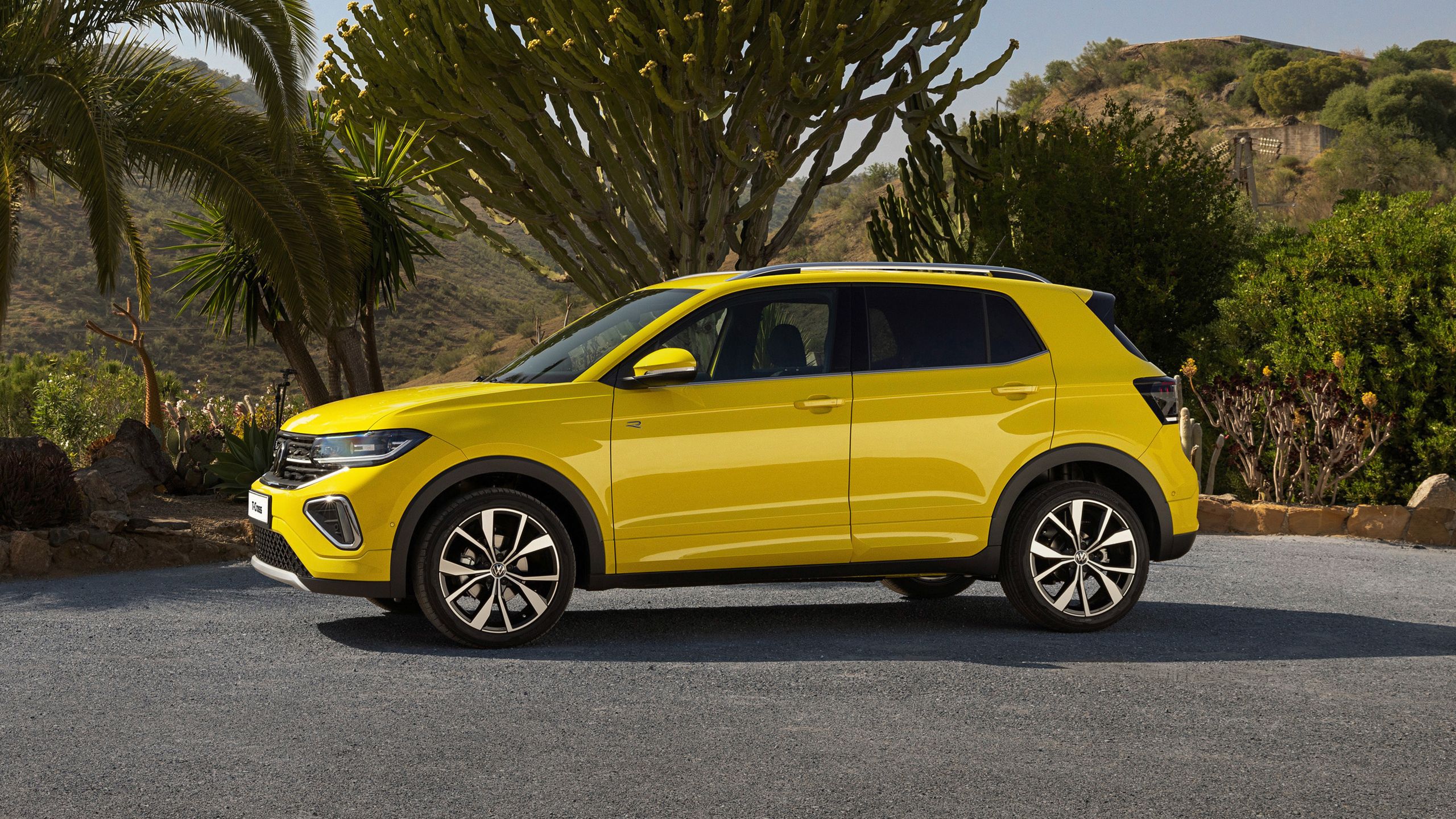 A grape-yellow new t-cross parked 