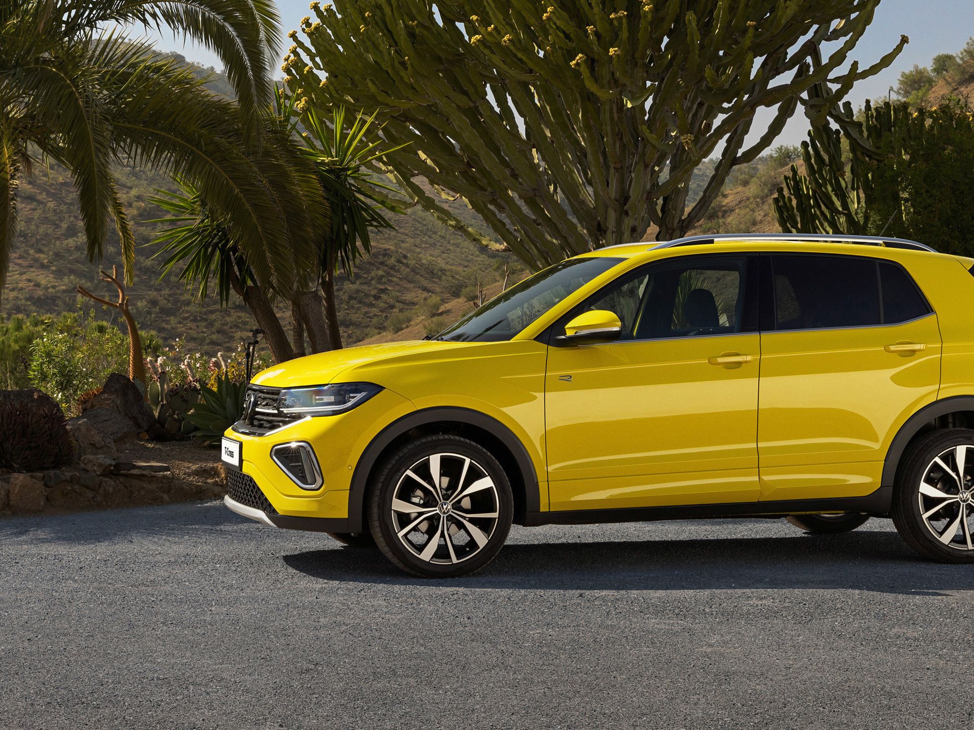 A grape-yellow new t-cross parked 