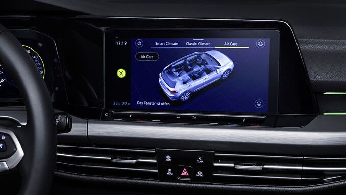 The infotainment display shows the "air care climatronic" feature which uses an air quality sensor with an active biogenic filter  