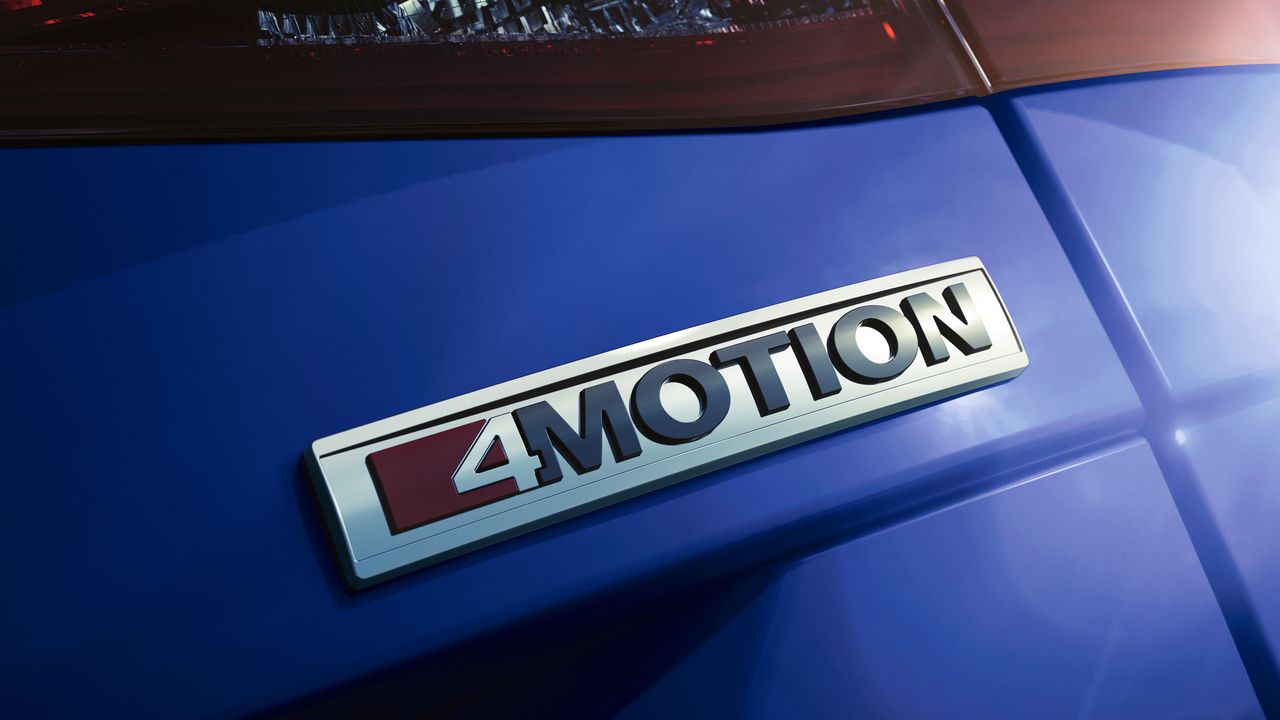 A close up look of the exterior of a Volkswagen vehicle's 4MOTION badge at its rear.