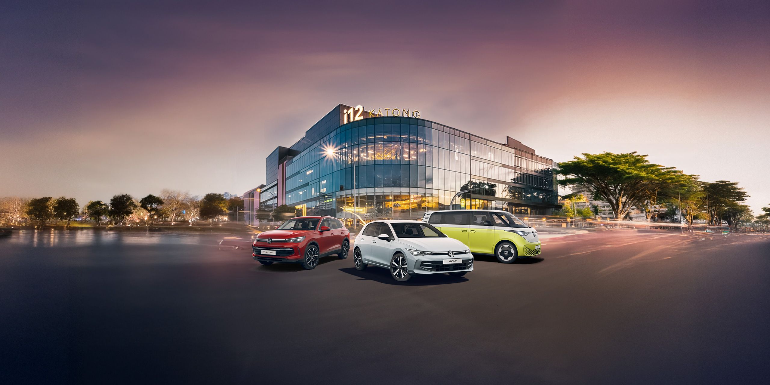 The Golf, Tiguan and ID. Buzz lined up in front of the i12 Katong facade